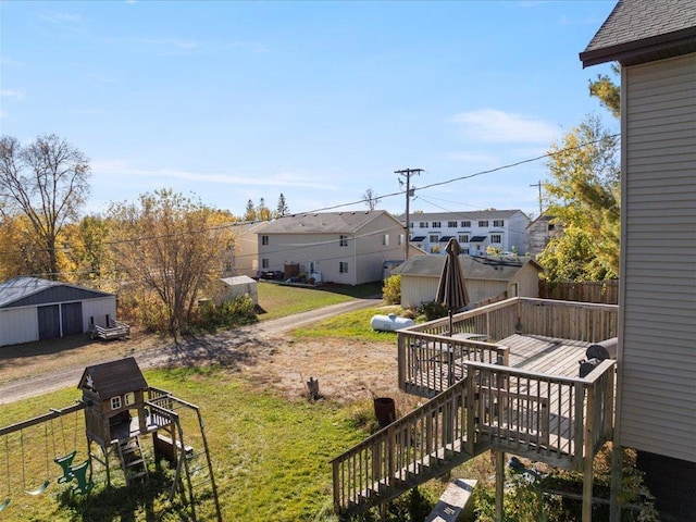 view of yard featuring a wooden deck