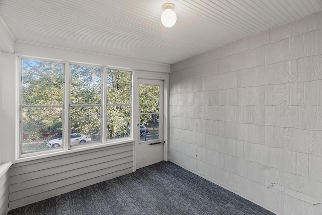 unfurnished sunroom featuring plenty of natural light