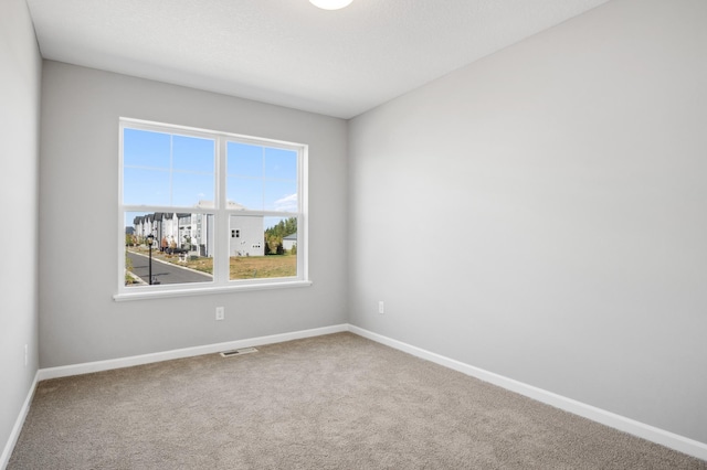 empty room featuring carpet