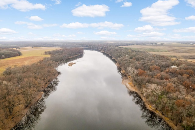 drone / aerial view featuring a water view and a rural view