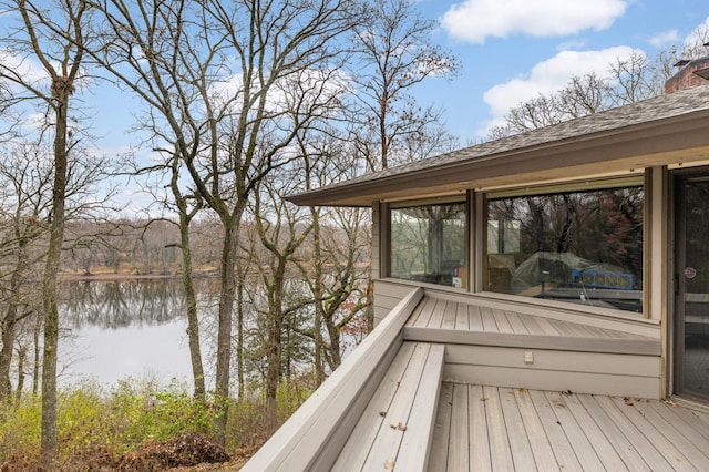 deck featuring a water view