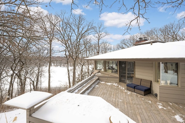 view of snow covered deck