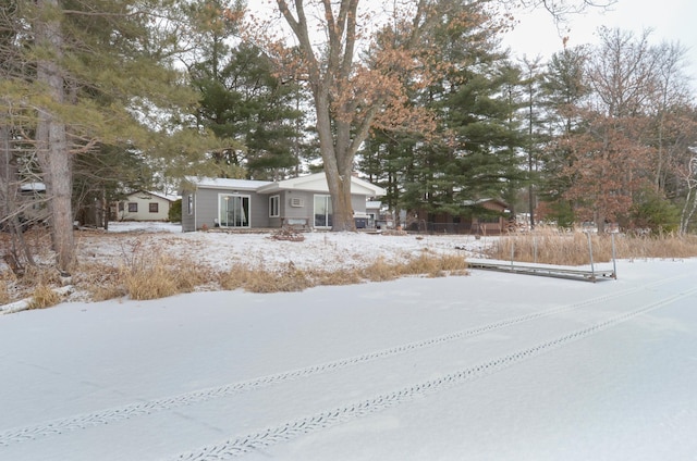 view of yard layered in snow