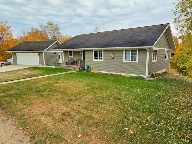 ranch-style house with a front yard and a garage