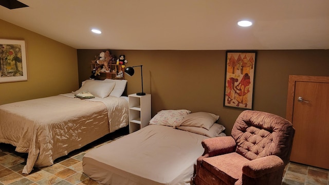 bedroom with vaulted ceiling