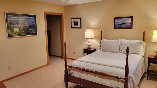 bedroom featuring light colored carpet