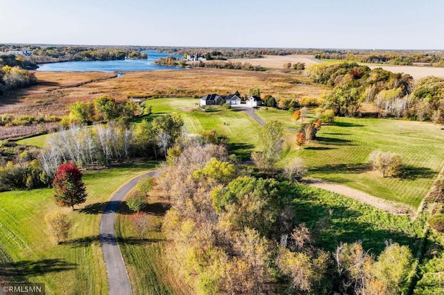 drone / aerial view featuring a water view and a rural view