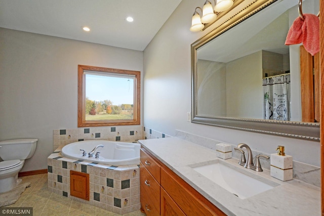 bathroom featuring vanity, tiled bath, toilet, and tile patterned floors