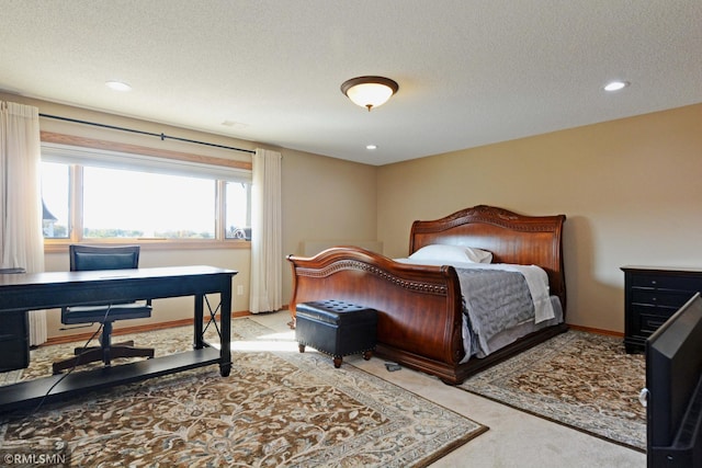 44154 Skogman Lake Rd, Fish Lake Twp, MN 55008 - carpeted bedroom with baseboards, recessed lighting, and a textured ceiling