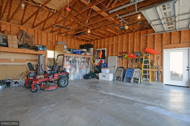 garage featuring a garage door opener