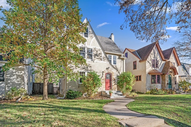 tudor house with a front lawn