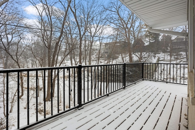 view of snow covered deck