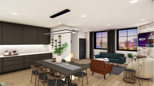 interior space with modern cabinets, light countertops, wood tiled floor, and recessed lighting