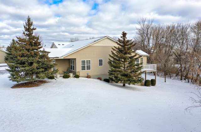 view of snow covered property