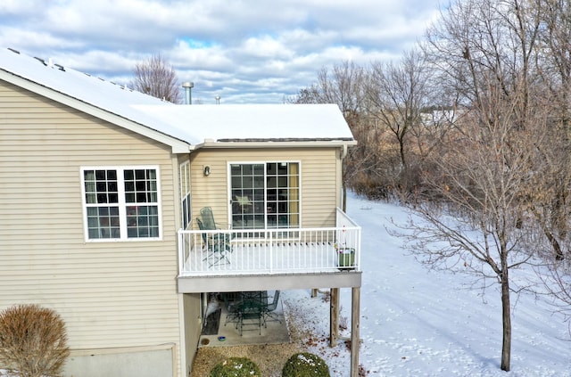 view of snow covered deck