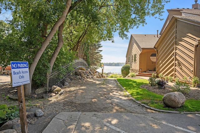 exterior space with a water view