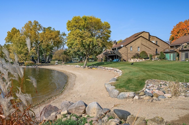 view of community featuring a yard