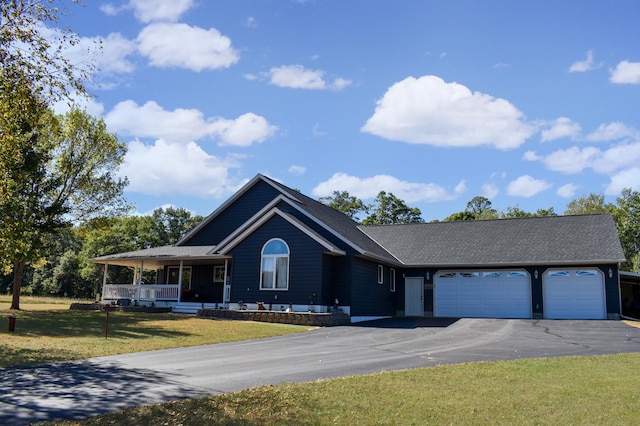 ranch-style house with driveway, a garage, a shingled roof, a porch, and a front lawn