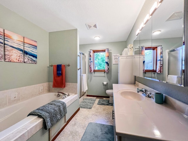 bathroom featuring a stall shower, toilet, visible vents, a garden tub, and vanity