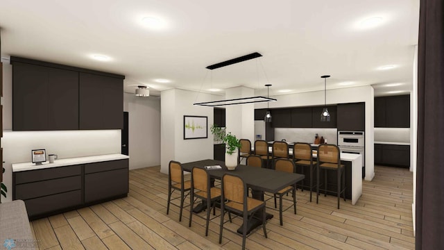 118 Broadway N Unit 602, Fargo, ND 58102 - dining area featuring light wood-style flooring
