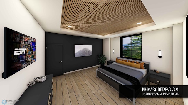 bedroom with wood-type flooring and a raised ceiling