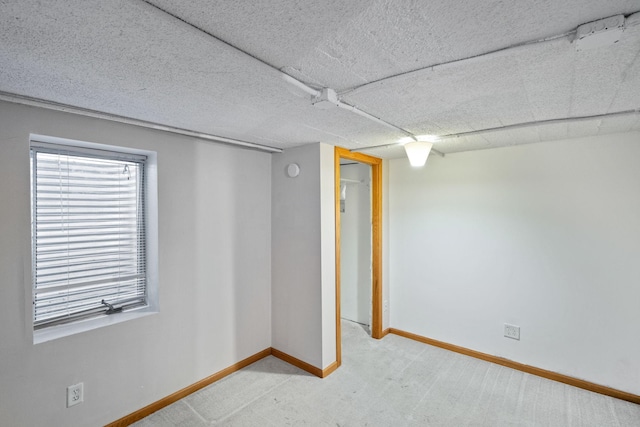 basement with light carpet