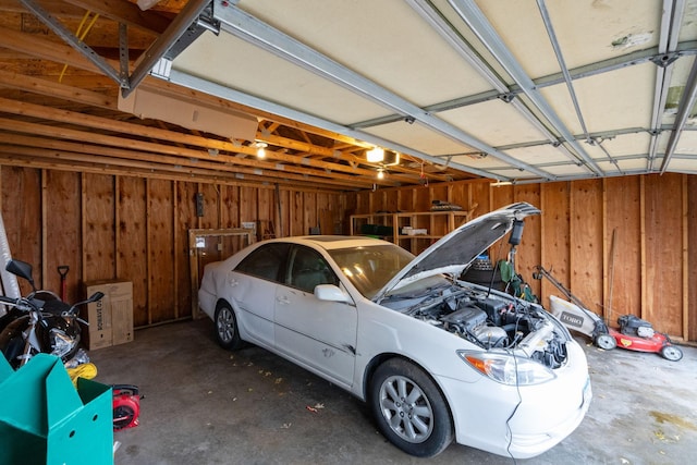 garage with wood walls