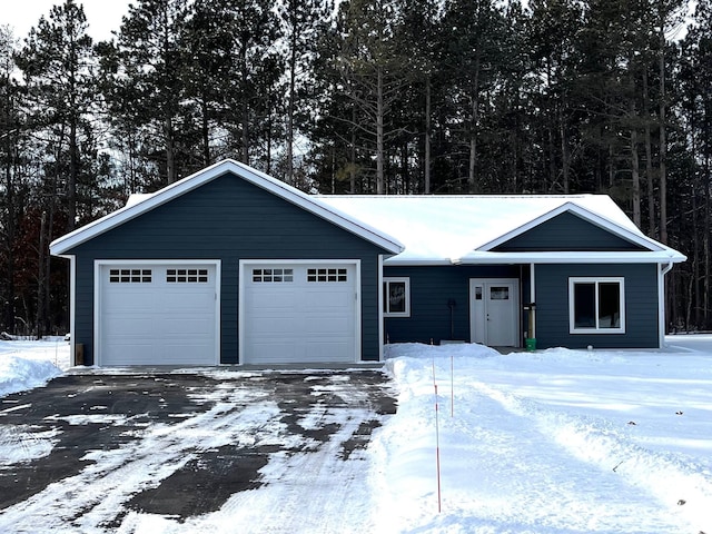 single story home with a garage