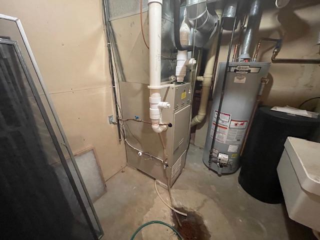 utility room with gas water heater and heating unit