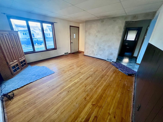 spare room featuring light hardwood / wood-style flooring