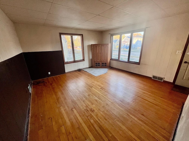 spare room with light wood-type flooring