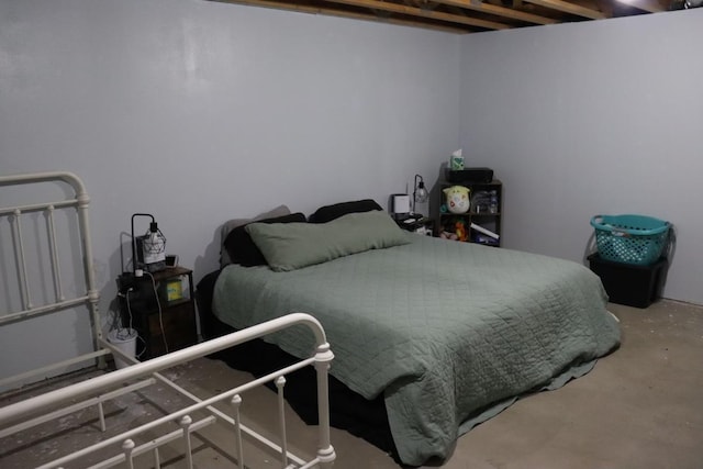 bedroom with concrete flooring