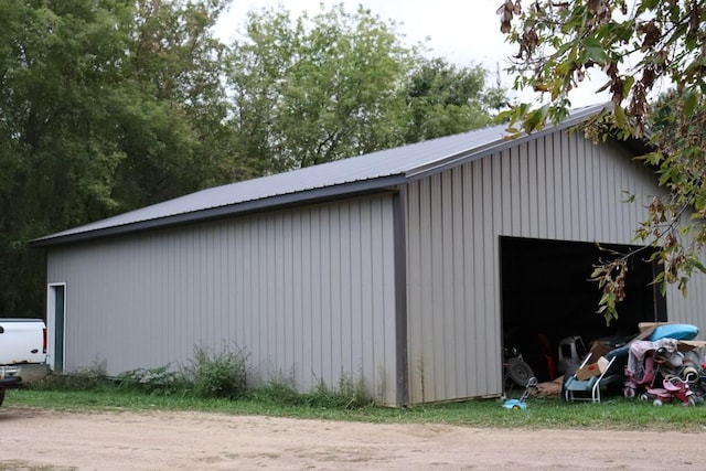 view of outbuilding featuring a garage