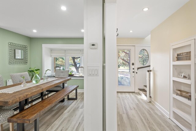 interior space with a healthy amount of sunlight and light wood-type flooring