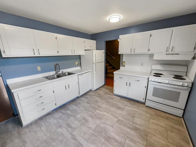 kitchen featuring white cabinetry, white appliances, sink, and a textured ceiling