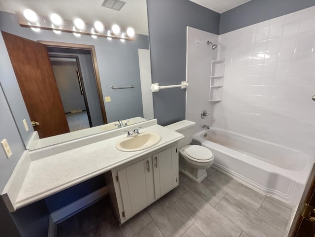 full bathroom with tile patterned floors, vanity, shower / bathtub combination, and toilet