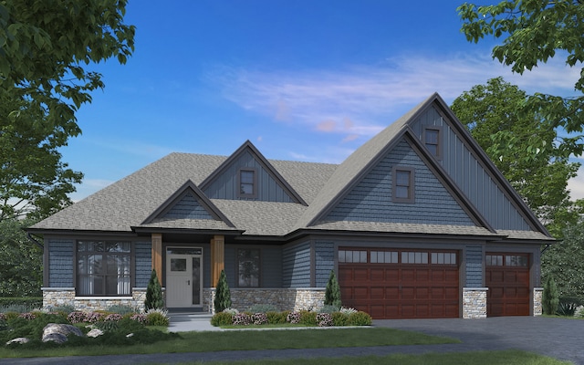 view of front of house with a front lawn and a garage