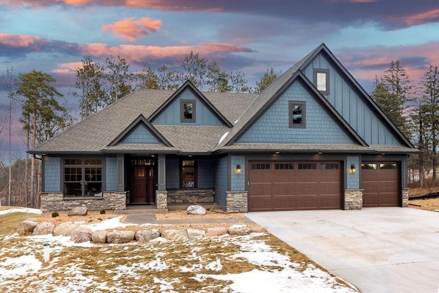 craftsman-style home with a garage