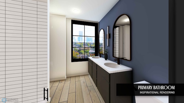 118 Broadway N Unit 702, Fargo, ND 58102 - full bath featuring wood finished floors and double vanity