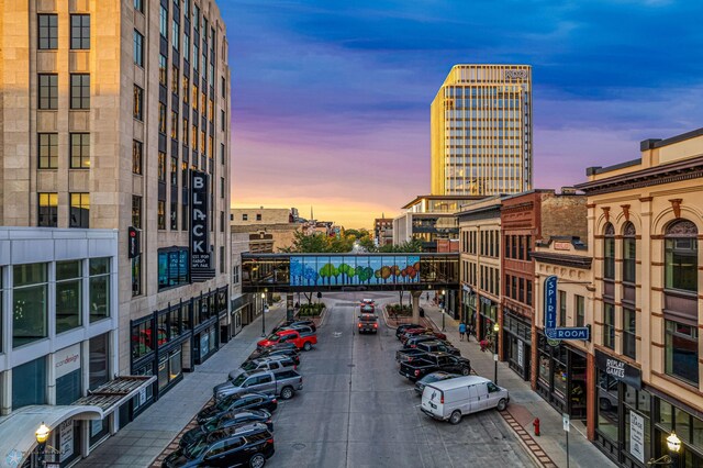 view of outdoor building at dusk