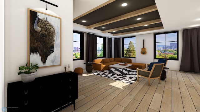 118 Broadway N Unit 703, Fargo, ND 58102 - sitting room with light wood-style floors and a raised ceiling