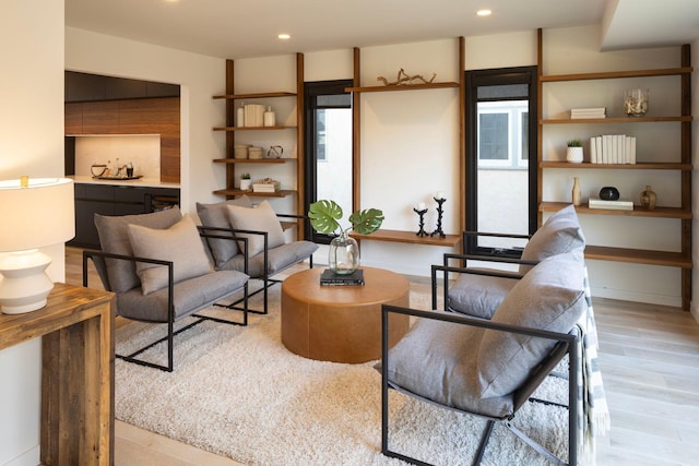 living room with light hardwood / wood-style floors