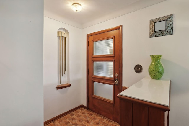 3522 Benjamin St NE, Minneapolis, MN 55418 - doorway with baseboards and arched walkways