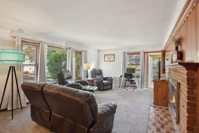 3522 Benjamin St NE, Minneapolis, MN 55418 - living area featuring a brick fireplace, carpet, and a desk