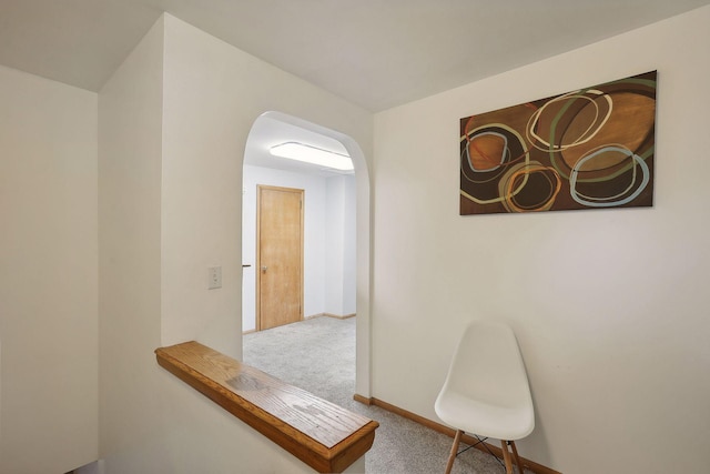 3522 Benjamin St NE, Minneapolis, MN 55418 - hallway featuring arched walkways, carpet, and baseboards