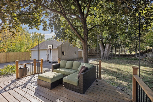 3522 Benjamin St NE, Minneapolis, MN 55418 - wooden terrace featuring an outdoor hangout area, fence, and a garage