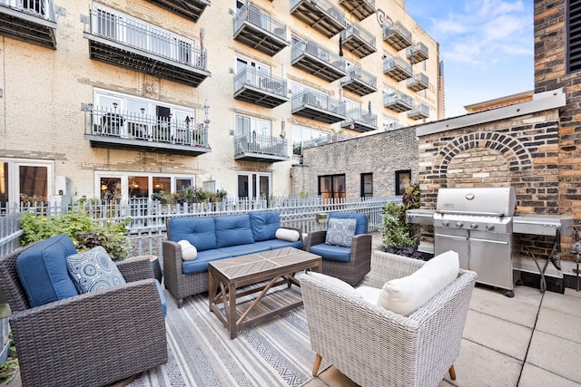 view of patio / terrace with outdoor lounge area and grilling area