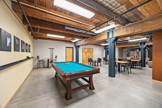 playroom with concrete floors and pool table