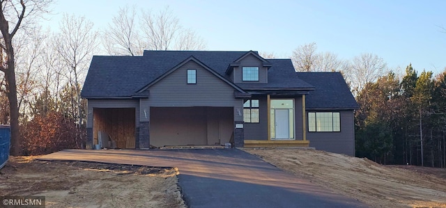 27532 Dahlia St NW, Isanti, MN 55040 - view of front of house with driveway and a garage
