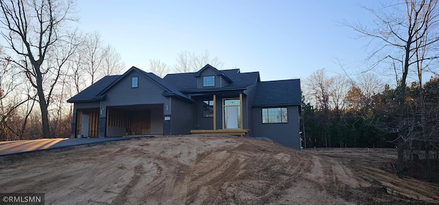 view of front of property featuring a garage